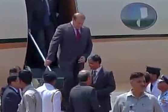 Modis oath taking PM Nawaz arrives in India